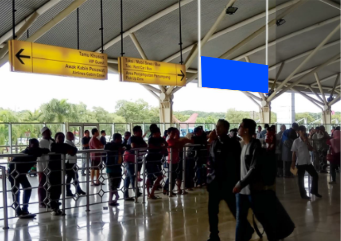 NEON BOX DEPAN PINTU KELUAR KEDATANGAN KANAN SULTAN HASANUDDIN INTERNATIONAL AIRPORT