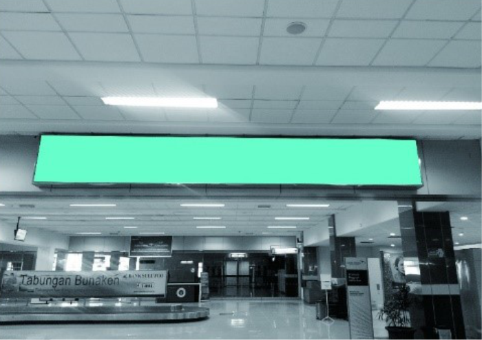 NEON BOX RING BALK RUANG BAGGAGE CLAIM SAM RATULANGI